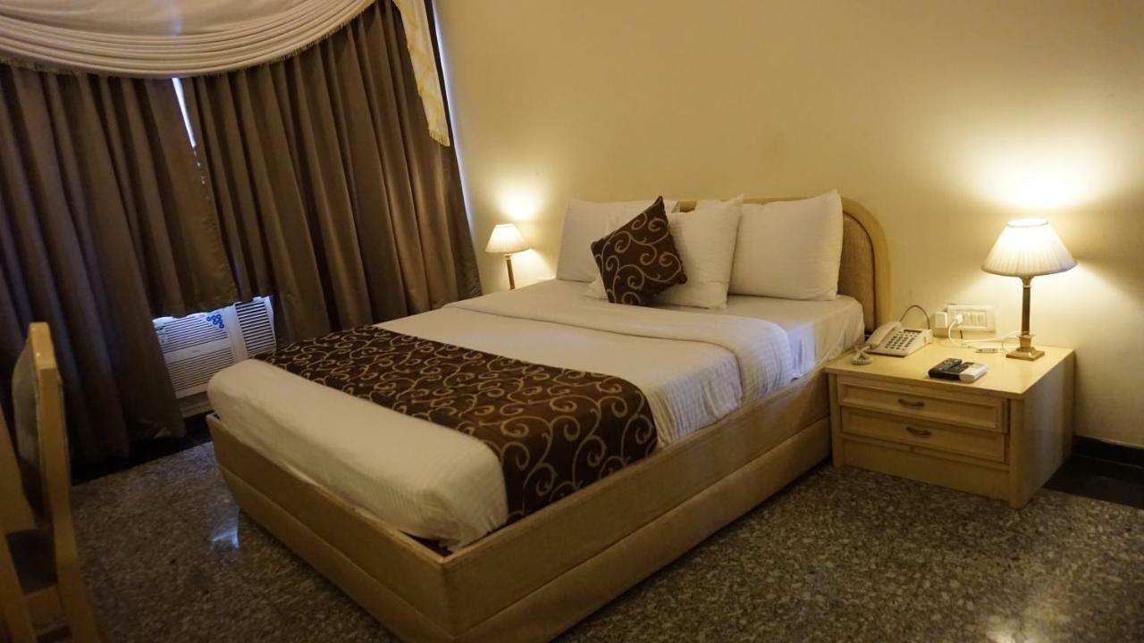 Hotel Poonja International Мангалор Екстериор снимка